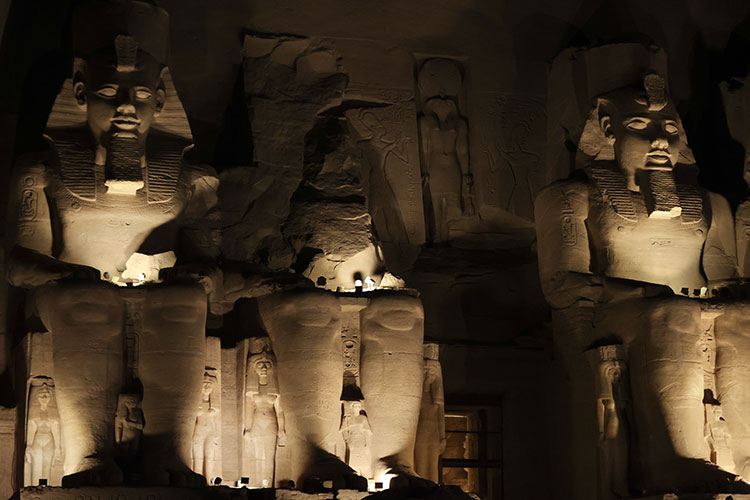 Sunlight illuminated the statue of Pharaoh Ramses II at the Abu Simbel Temple